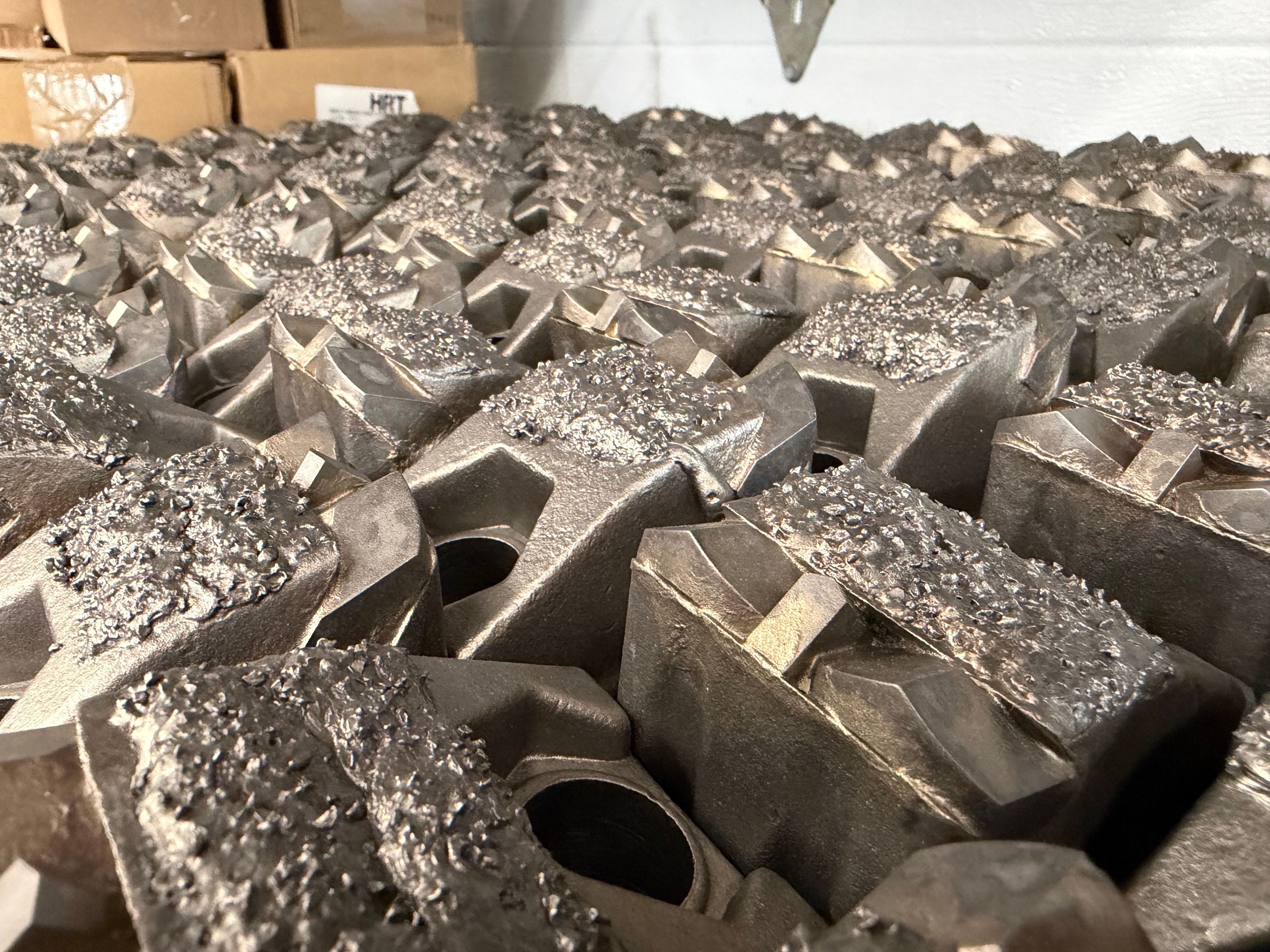 Carbide mulcher tooling and cutting components close-up